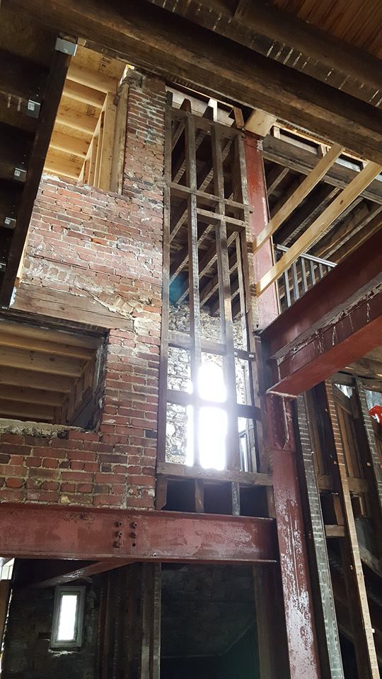 New openings were made for the main stairways in four of the five units.
