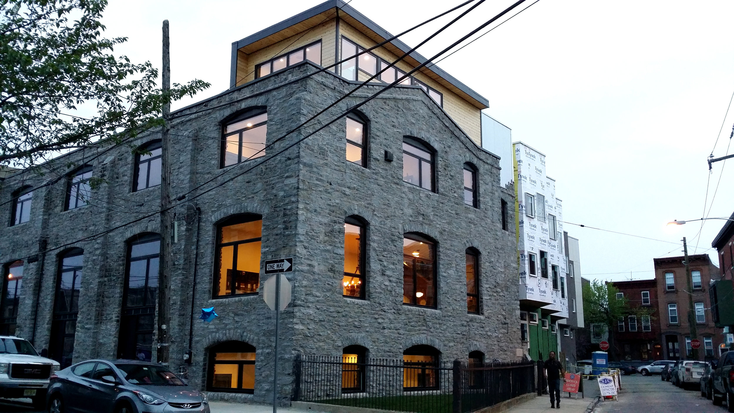 The stone portion is the original building; the wood addition on top is new and contains the master bedroom suite.