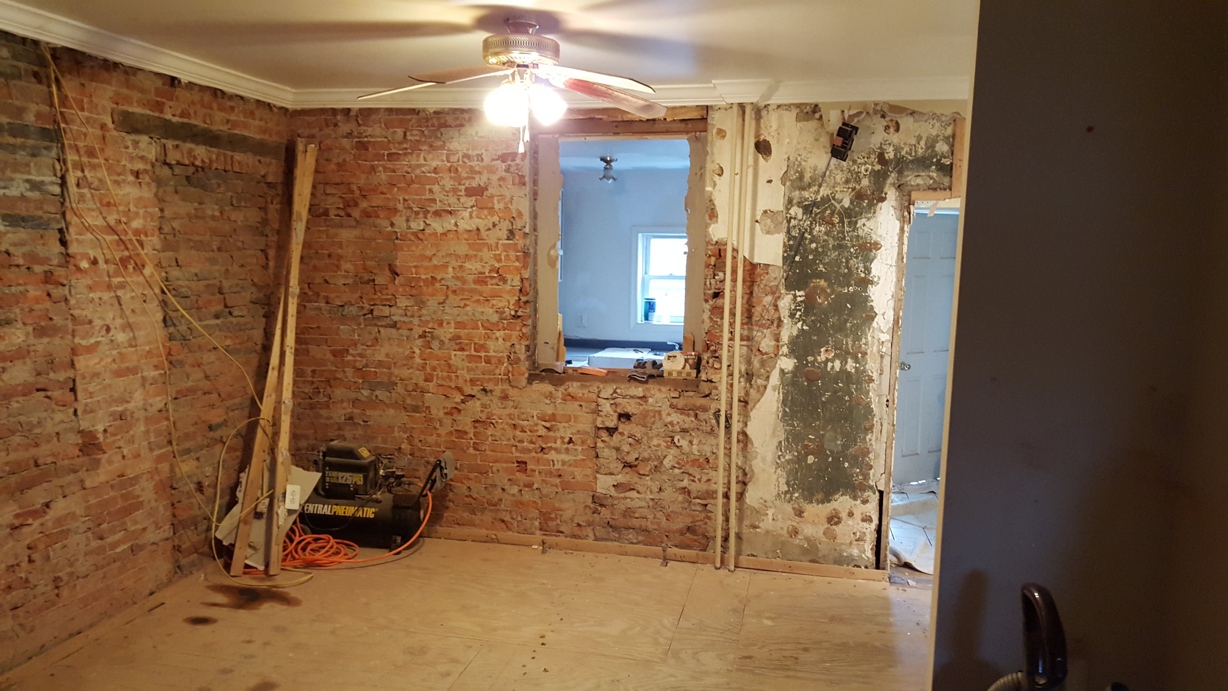 These brick walls tell a story of many changes over time. Much of the brick will remain exposed.