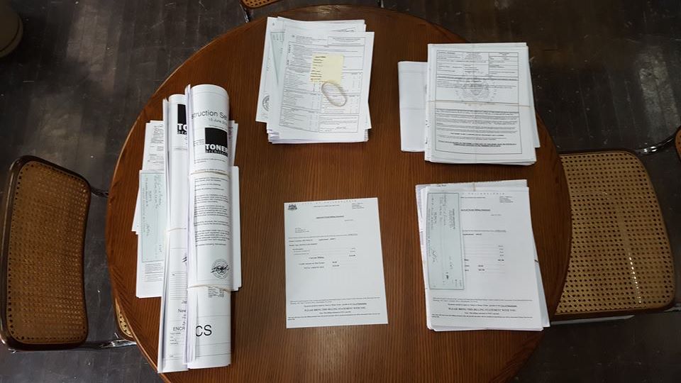 assembling permit materials for five current projects
