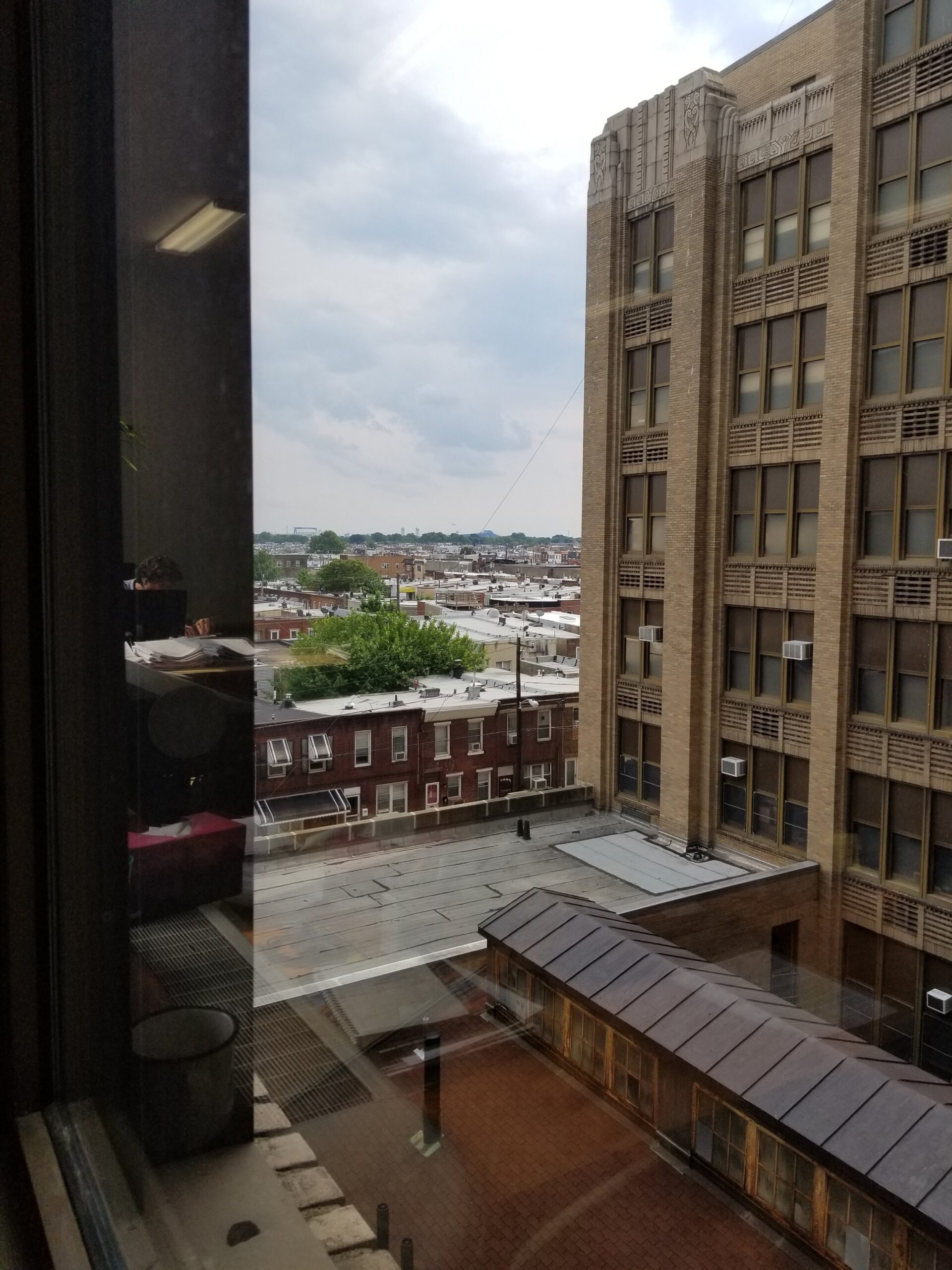 Peeking out over the old boiler room to the South Philly skyline.
