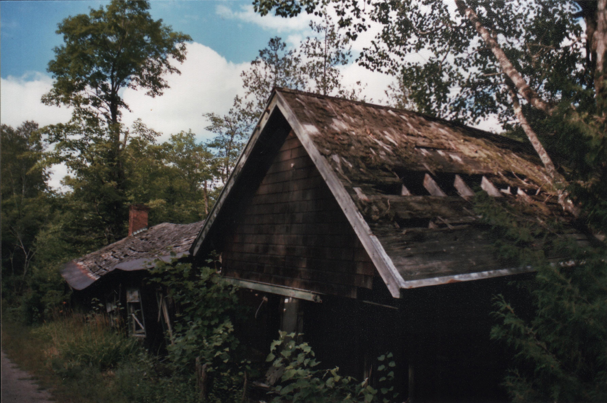 Sagged – This house was originally at grade, but has sunk on settled foundations