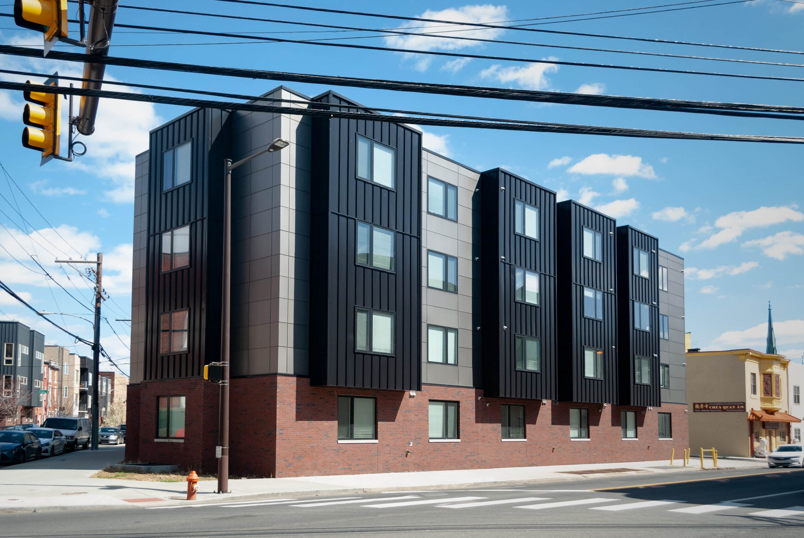 Modern multifamily apartment building building featuring commercial architecture design by Toner Architects